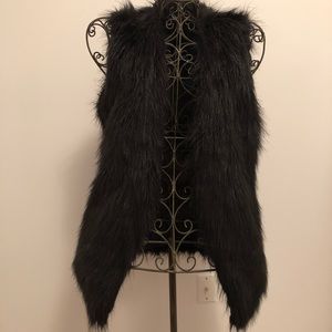 Black faux fur vest
